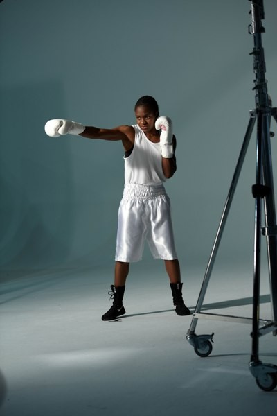 Nicola Adams, full length, throwing a jab