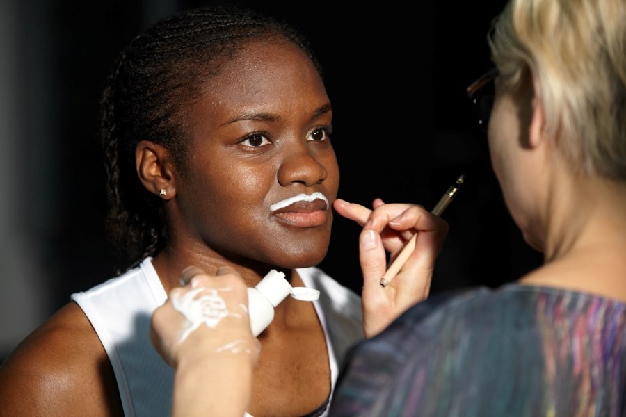 Nicola Adams having the milk moustache painted on