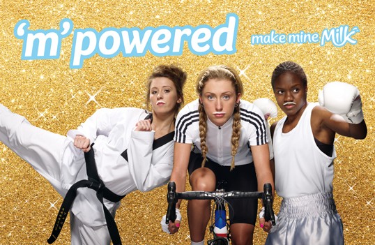 The finished ad in the landscape layout of the makeminemilk.co.uk home-page slide: Jones kicking, Trott on the bike, Adams with gloves, “’m’powered” and “make mine Milk” (538 pixels)