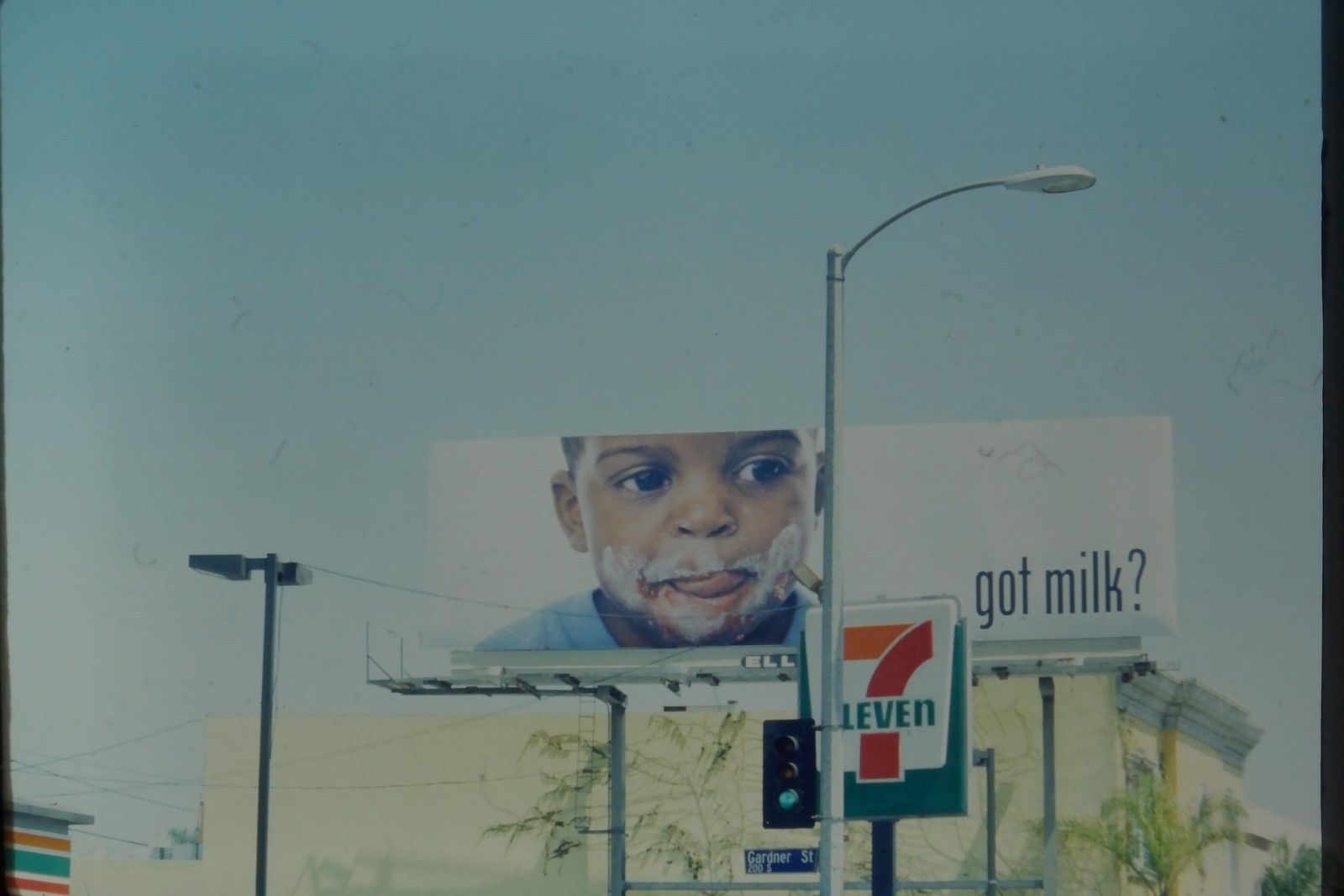 got milk? billboard with a child’s milk-smeared face, Los Angeles (street photograph)