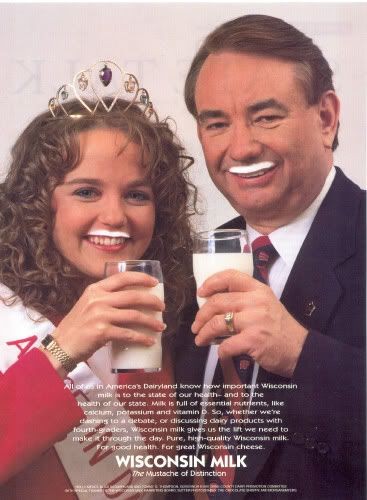 Holly Meudt & Gov. Tommy Thompson — “Wisconsin Milk: The Mustache of Distinction” (1997)